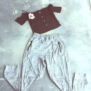Crop top, grey sweats, 1 scrunchie.
